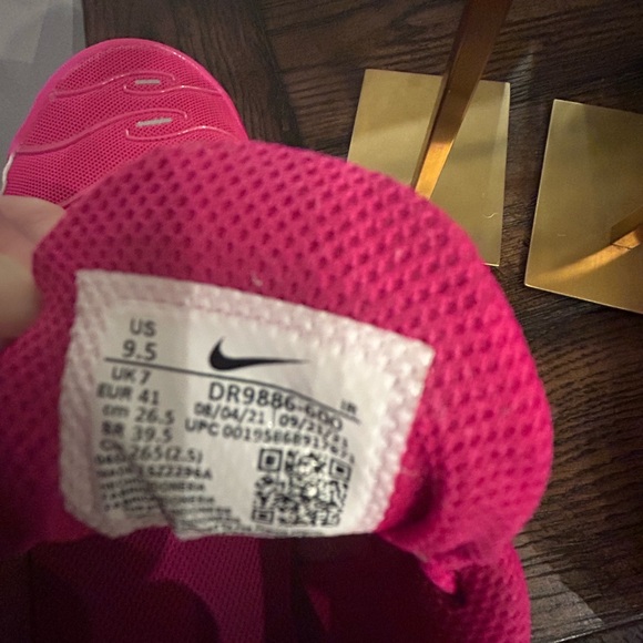 Nike Air Max Plus in a hot pink and white colorway. - Picture 8 of 10